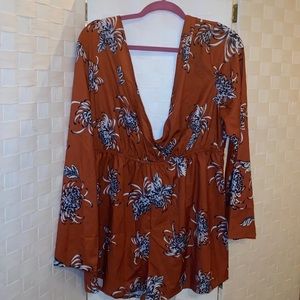 Orange, black and cream romper